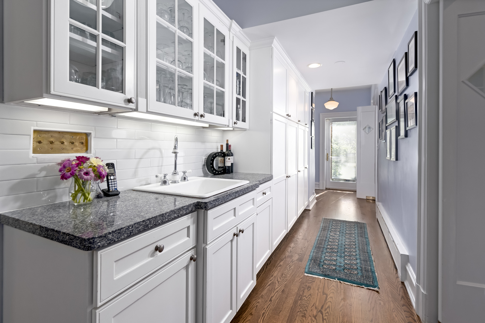 1111 Sheridan Road Wilmette, IL 60091 - Photo 26 of 76 a kitchen with sink and cabinets