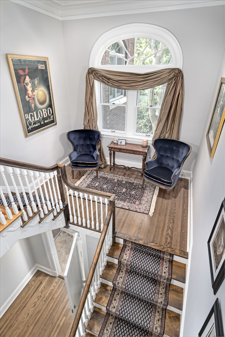 1111 Sheridan Road Wilmette, IL 60091 - Photo 34 of 76 a living room with furniture and a large window