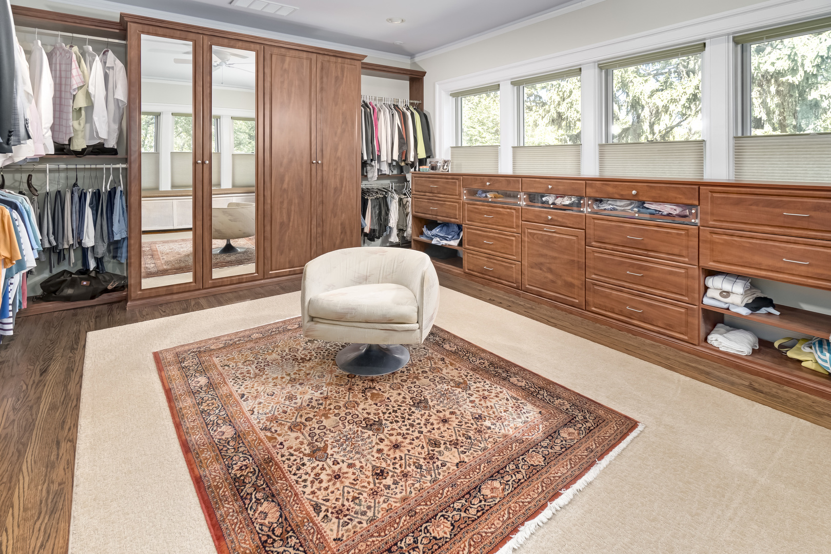 1111 Sheridan Road Wilmette, IL 60091 - Photo 38 of 76 a living room with a couch and large windows with wooden floor