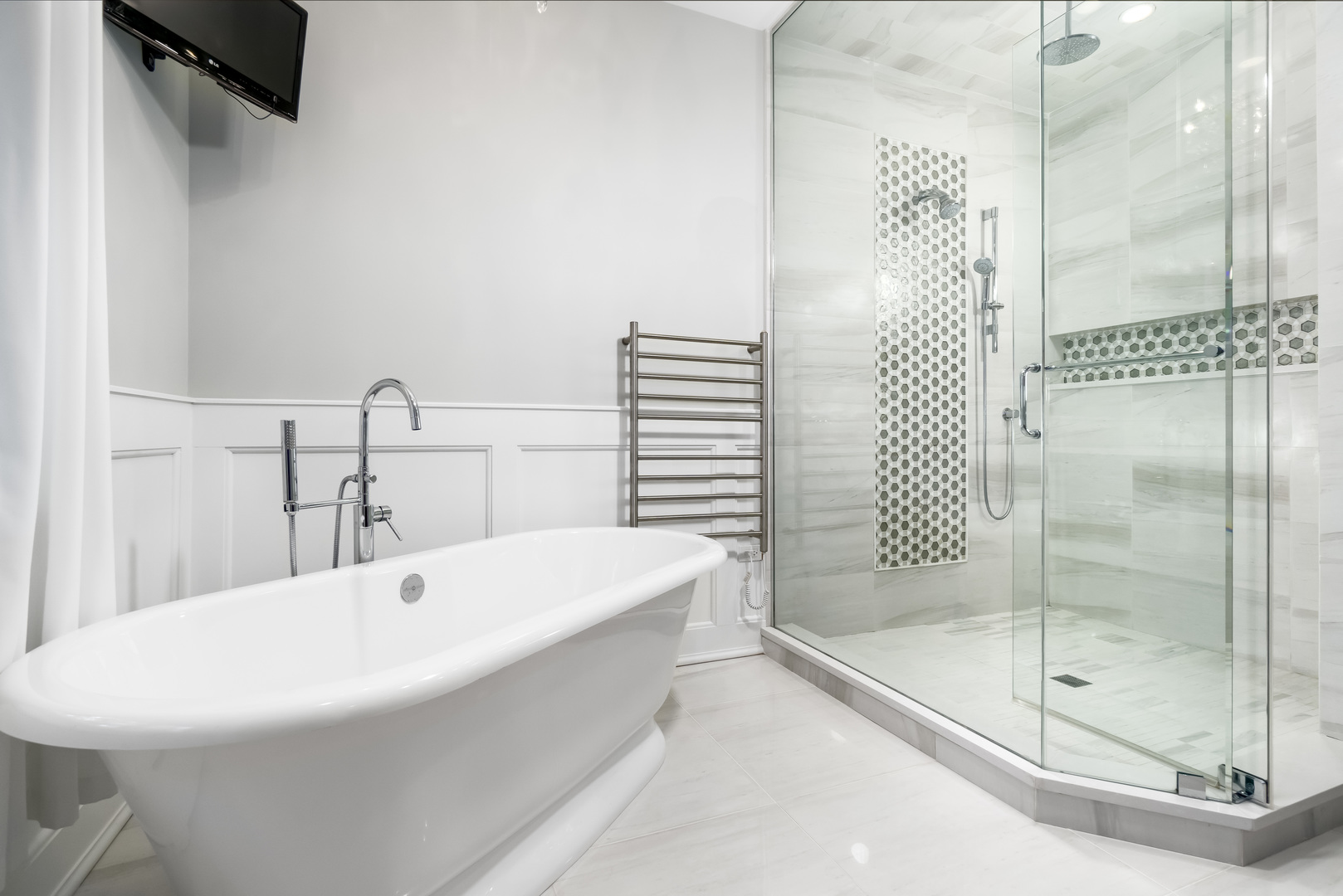 1111 Sheridan Road Wilmette, IL 60091 - Photo 41 of 76 a bathroom with a bathtub and a shower