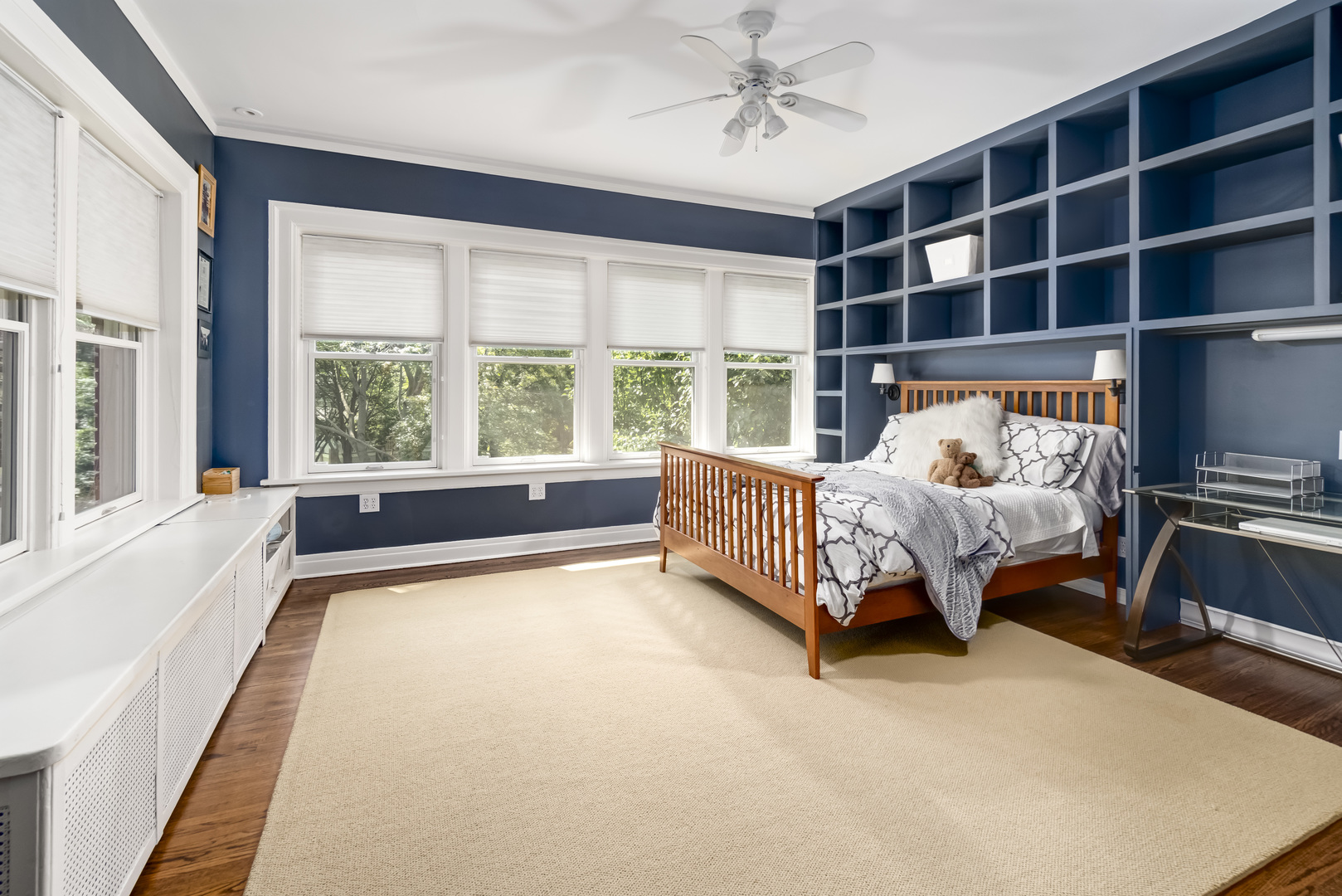1111 Sheridan Road Wilmette, IL 60091 - Photo 45 of 76 a spacious bedroom with a bed couch and a large window