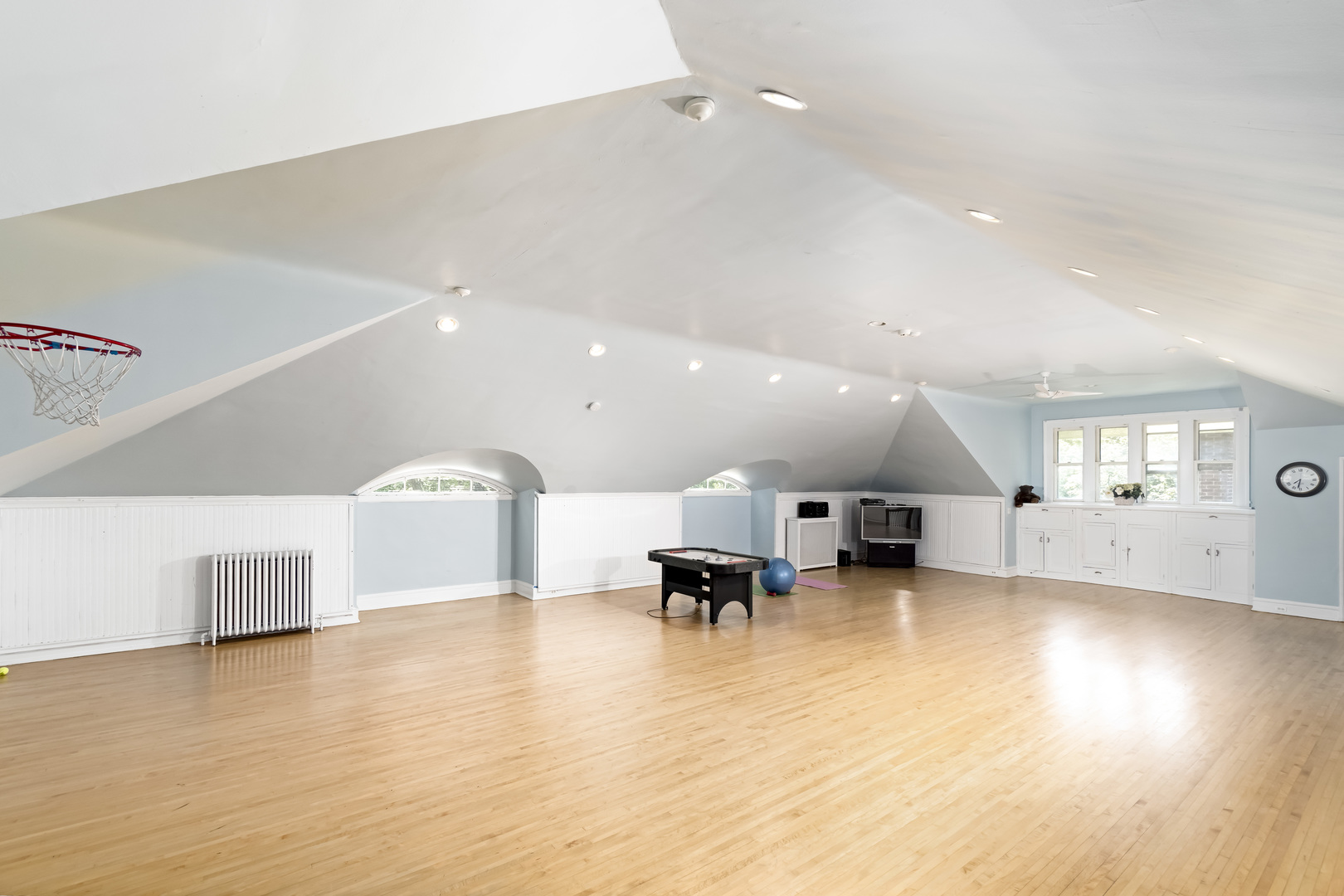 1111 Sheridan Road Wilmette, IL 60091 - Photo 50 of 76 a living room with furniture and kitchen view with wooden floor