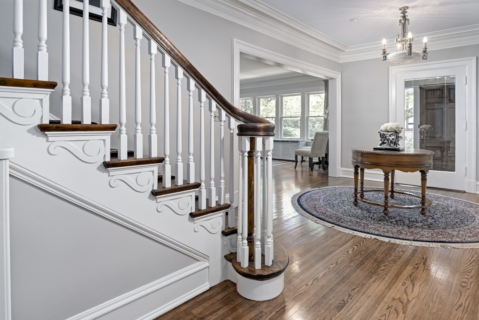 1111 Sheridan Road Wilmette, IL 60091 - Photo 6 of 76 a view of entryway and hall with wooden floor