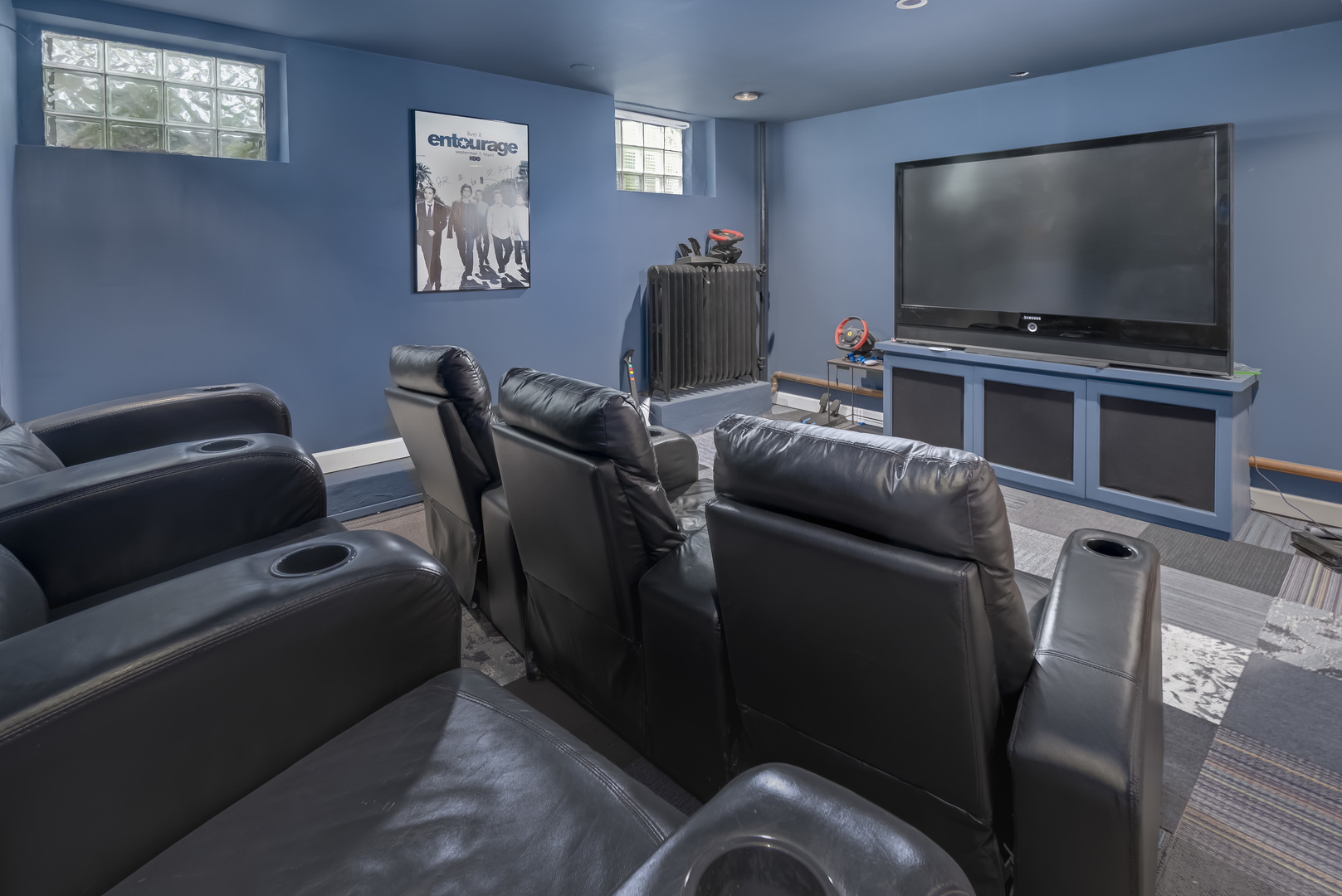 1111 Sheridan Road Wilmette, IL 60091 - Photo 56 of 76 a living room with furniture and a flat screen tv