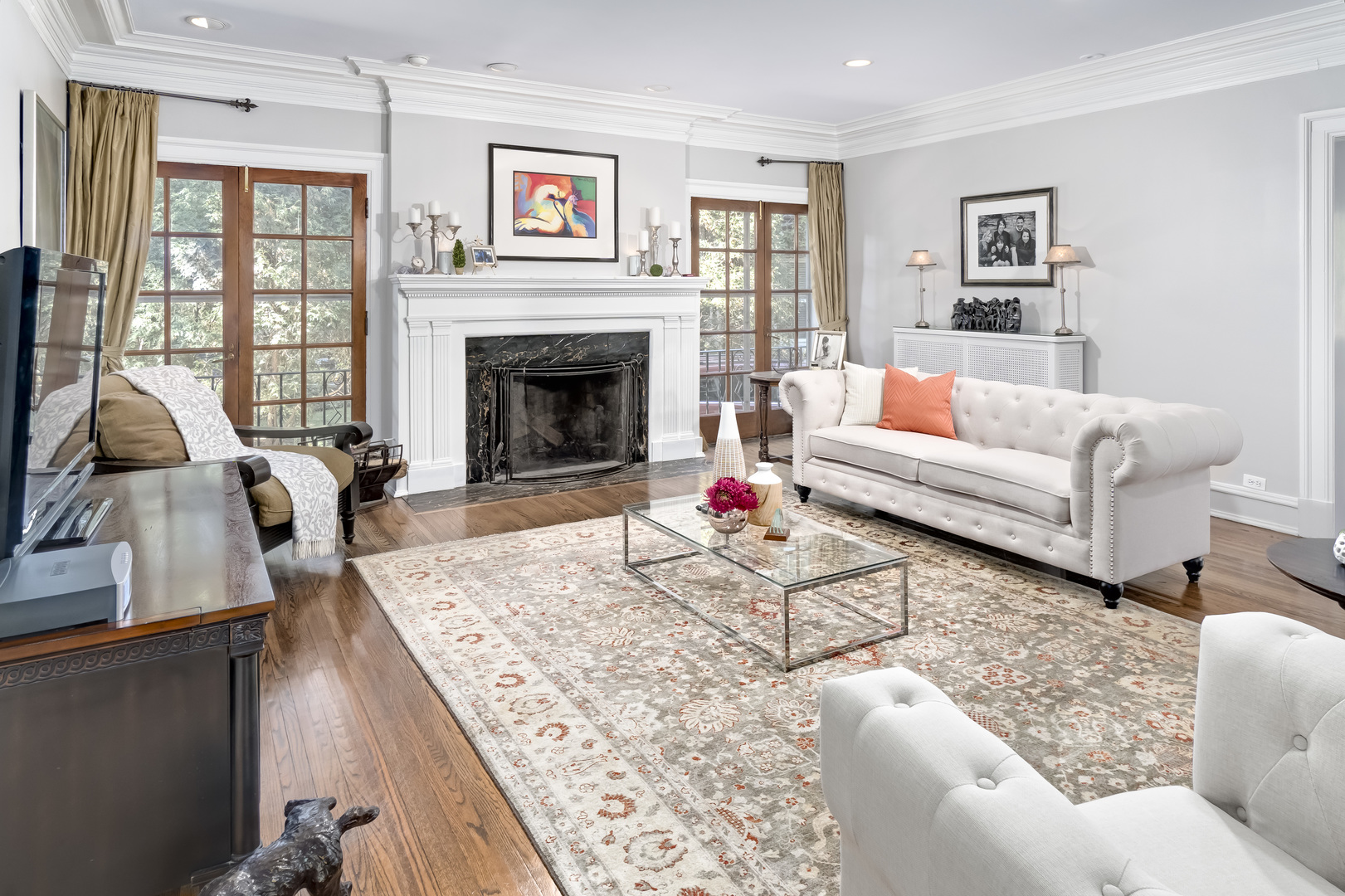 1111 Sheridan Road Wilmette, IL 60091 - Photo 9 of 76 a living room with furniture and a fireplace