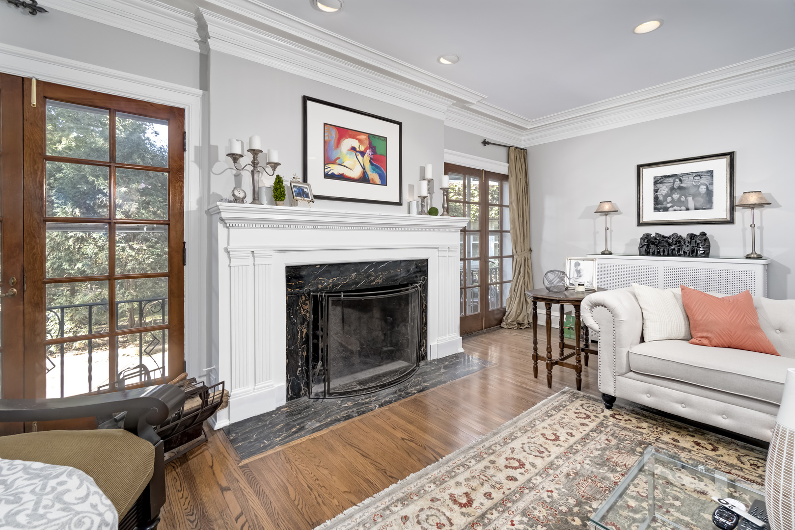 1111 Sheridan Road Wilmette, IL 60091 - Photo 10 of 76 a living room with furniture and a fireplace