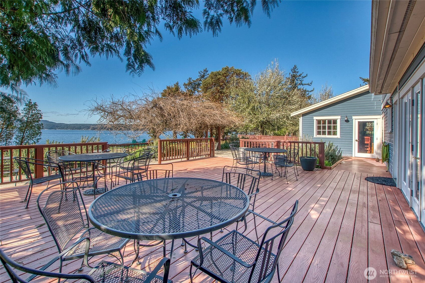 326 Olga Road Orcas Island, WA 98245 - Photo 21 of 39 a view of a house with backyard and sitting area