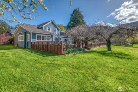 a view of a dining room with furniture window and outdoor kitchen