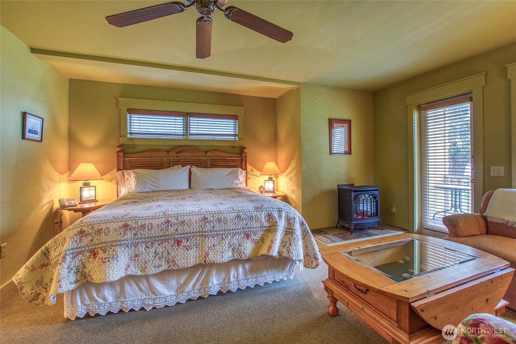 326 Olga Road Orcas Island, WA 98245 - Photo 27 of 39 a bedroom with a bed and window