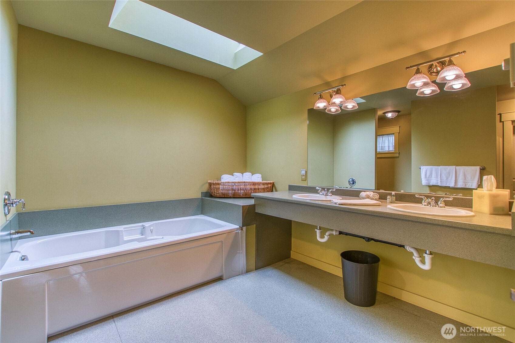 326 Olga Road Orcas Island, WA 98245 - Photo 30 of 39 a bathroom with a sink a large mirror and a bathtub