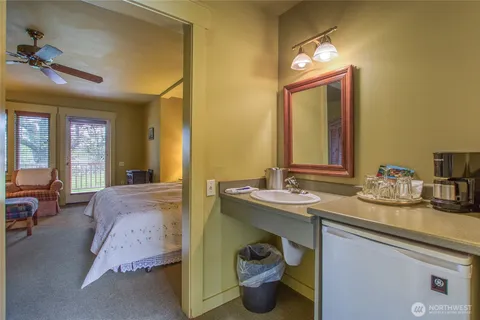 a view of a balcony with wooden floor