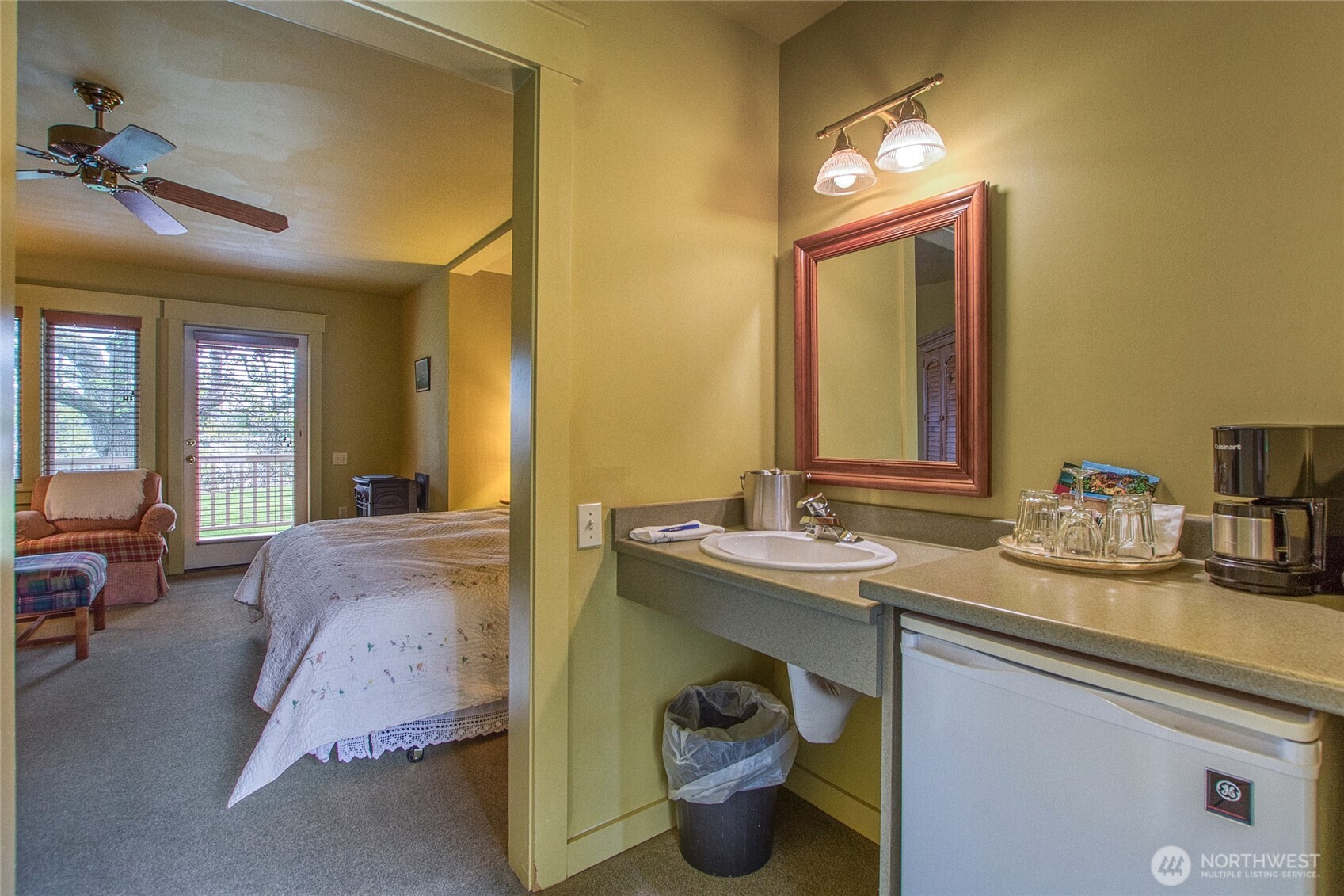 326 Olga Road Orcas Island, WA 98245 - Photo 32 of 39 a en suite bathroom with a granite countertop sink and a mirror