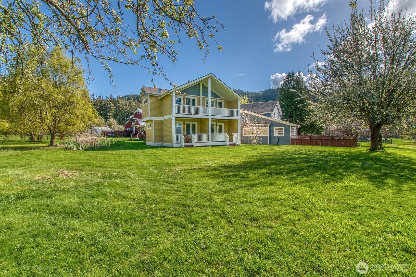 326 Olga Road Orcas Island, WA 98245 - Photo 35 of 39 a view of a house with a yard