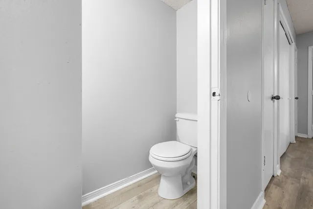 a bathroom with a toilet and a sink