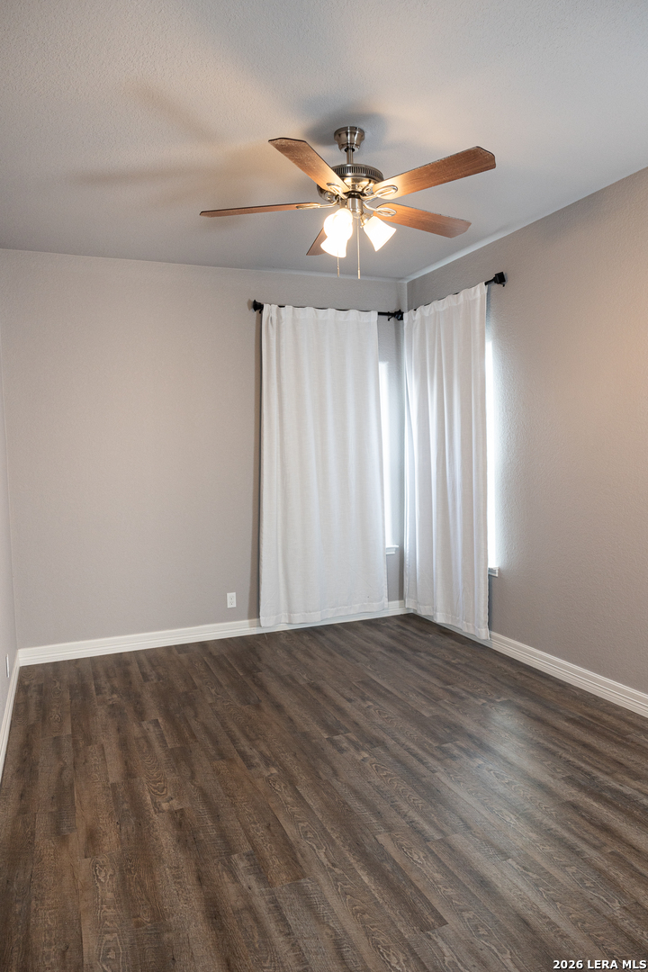20 Rio Seco Uvalde, TX 78801 - Photo 13 of 21 a view of an empty room with wooden floor and a window