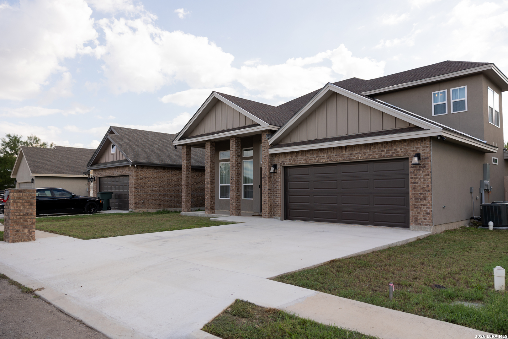 20 Rio Seco Uvalde, TX 78801 - Photo 2 of 21 a front view of a house with a yard and garage