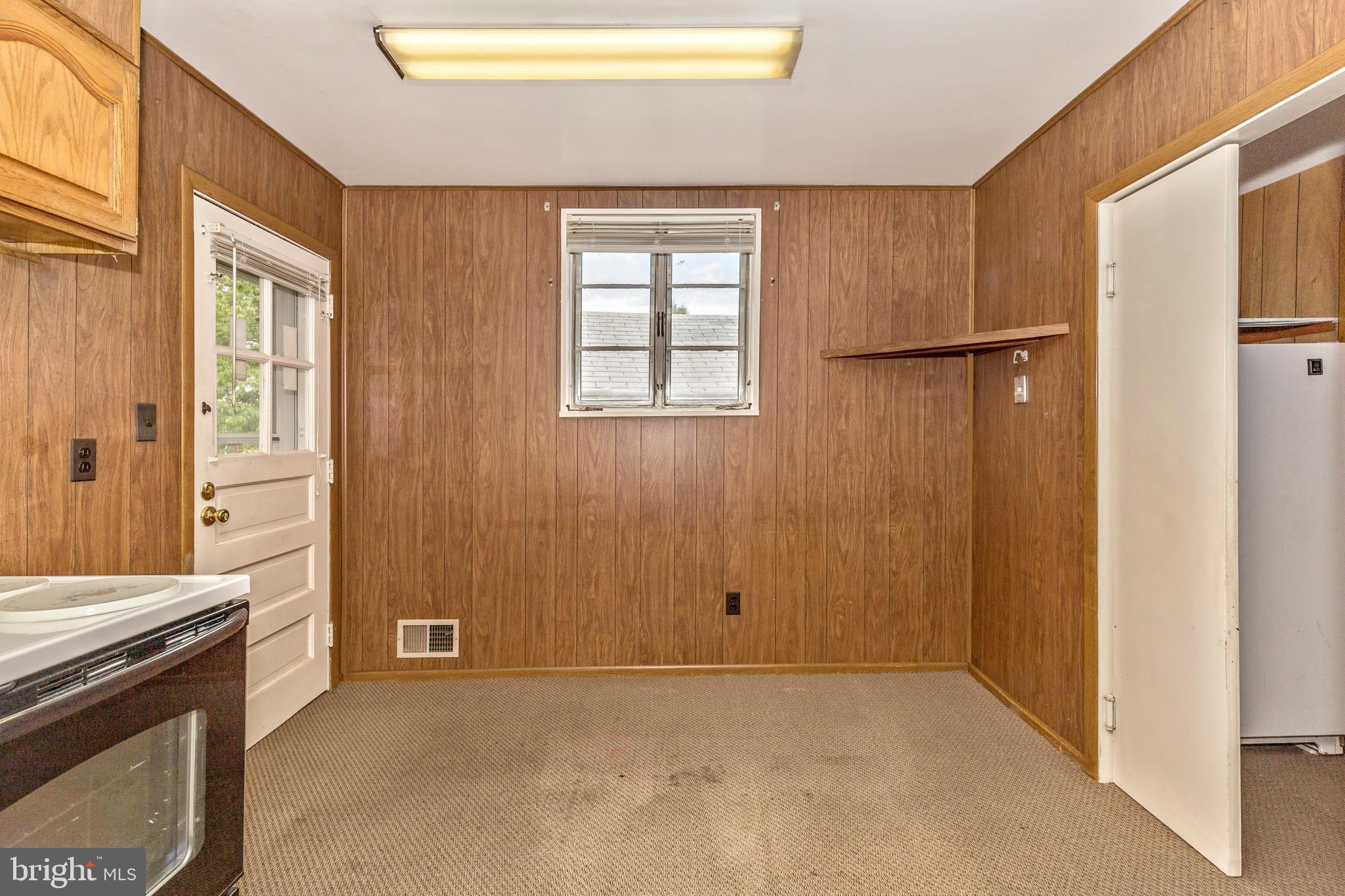 3929 Weller Road Silver Spring, MD 20906 - Photo 16 of 54 an empty room with windows