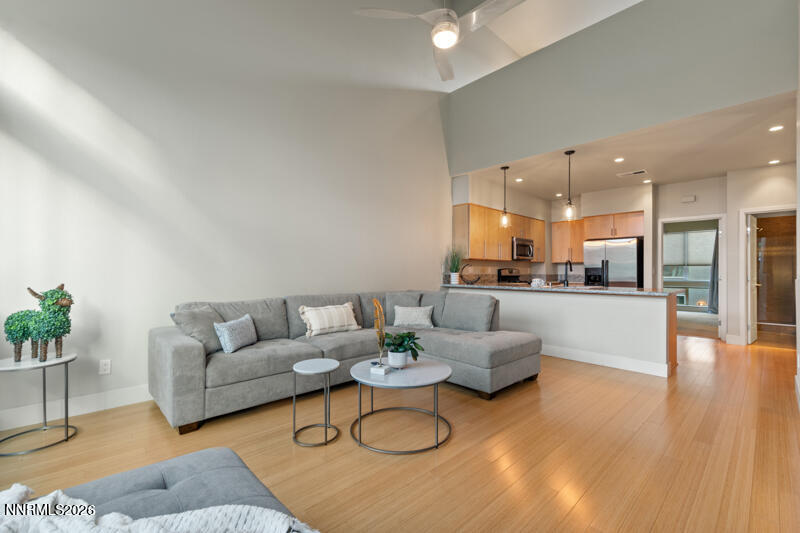 374 State Street Reno, NV 89501 - Photo 4 of 16 a living room with furniture and kitchen view