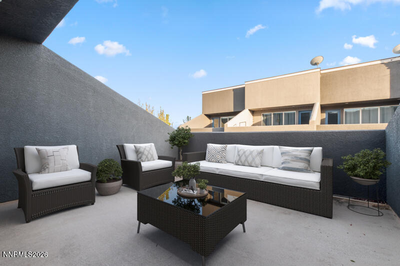 374 State Street Reno, NV 89501 - Photo 5 of 16 a living room with furniture and a potted plant