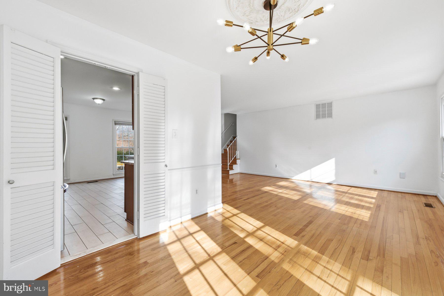 11733 Becket Street Potomac, MD 20854 - Photo 10 of 27 a view of a bedroom with wooden floor