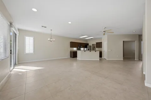 a view of a livingroom with a kitchen