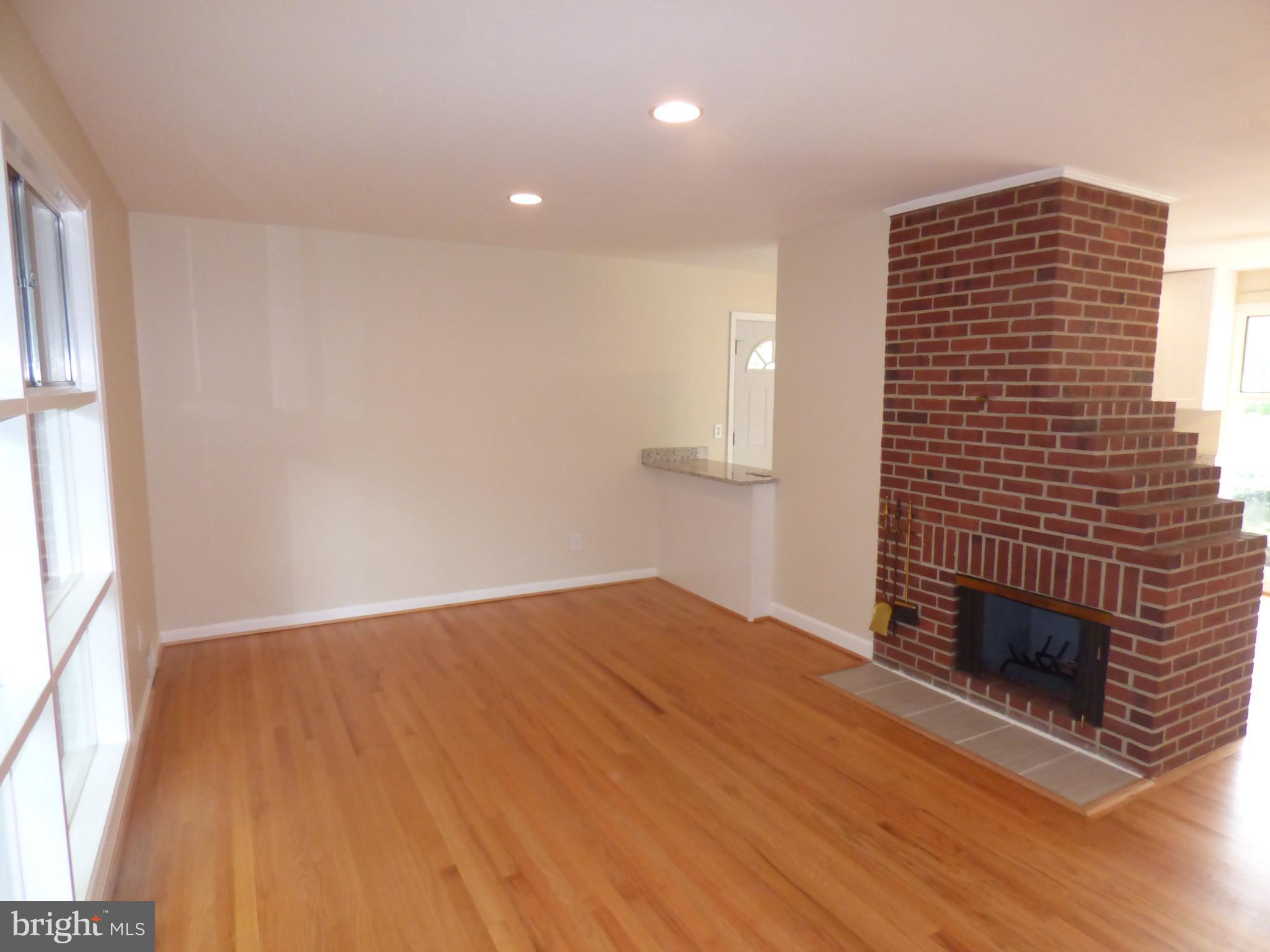 6603 Edsall Road Springfield, VA 22151 - Photo 10 of 30 a view of an empty room with wooden floor and a window