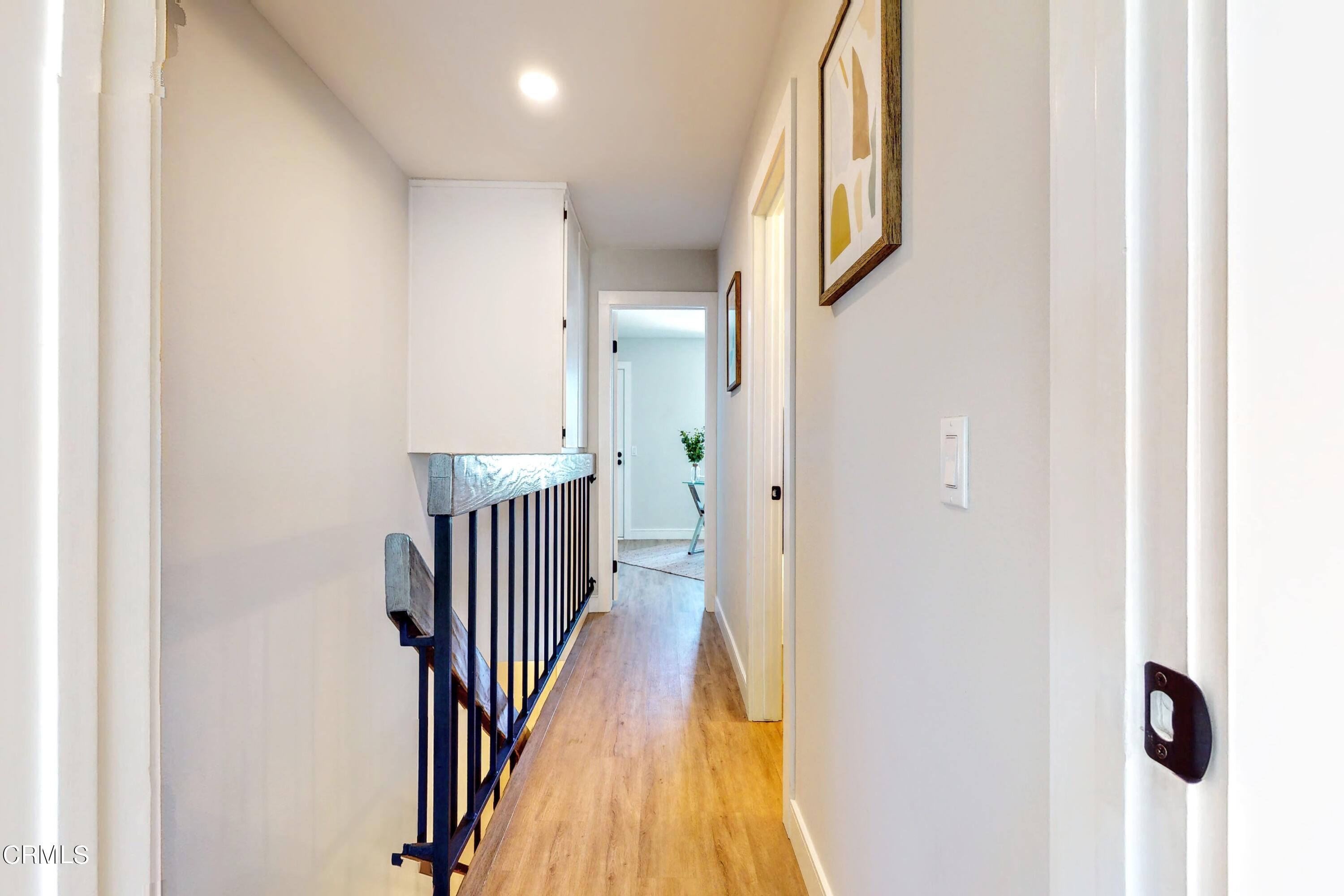 263 South Ventura Road, Unit 272 Port Hueneme, CA 93041 - Photo 17 of 40 a view of a hallway with wooden floor