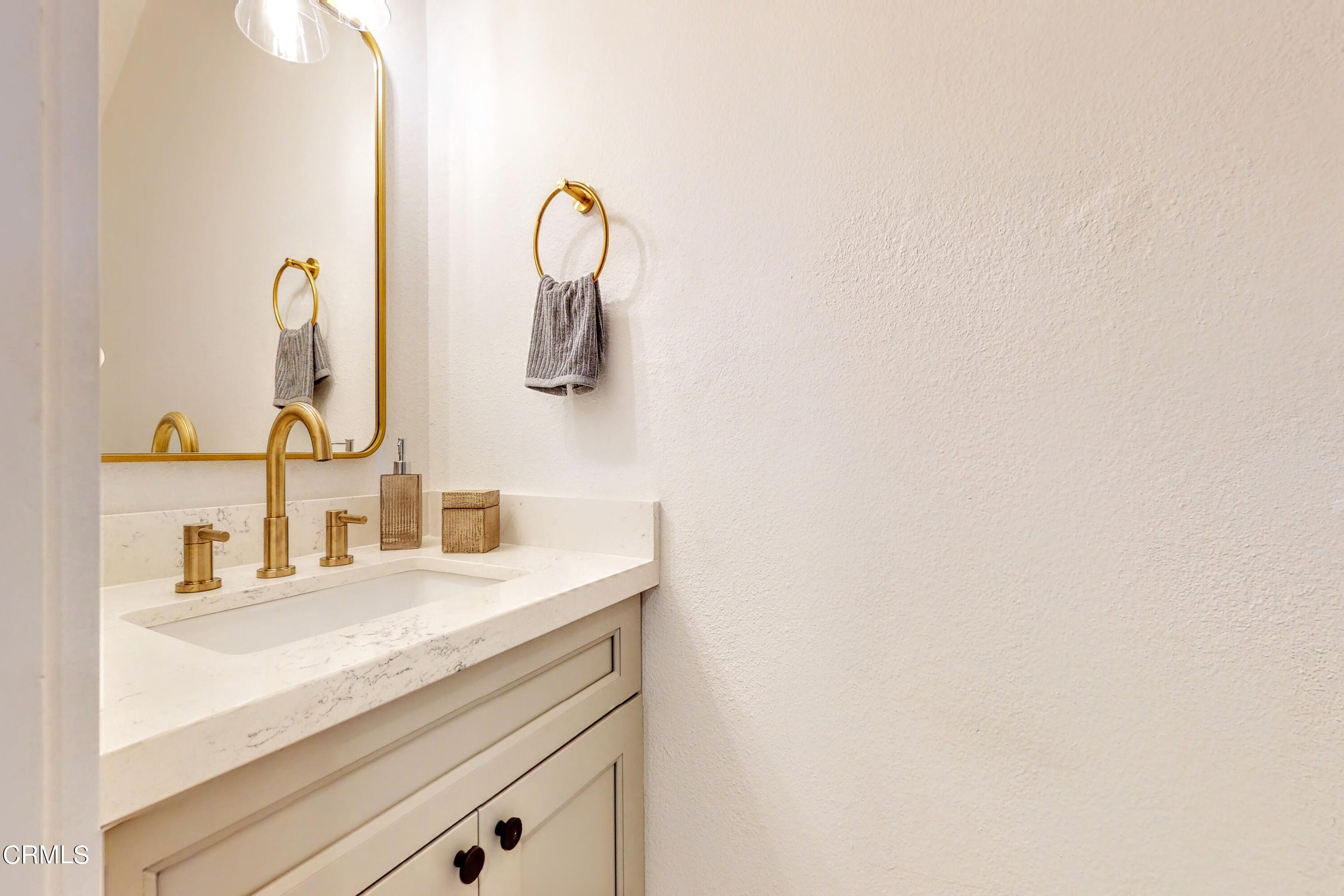 263 South Ventura Road, Unit 272 Port Hueneme, CA 93041 - Photo 18 of 40 a bathroom with a sink and a mirror