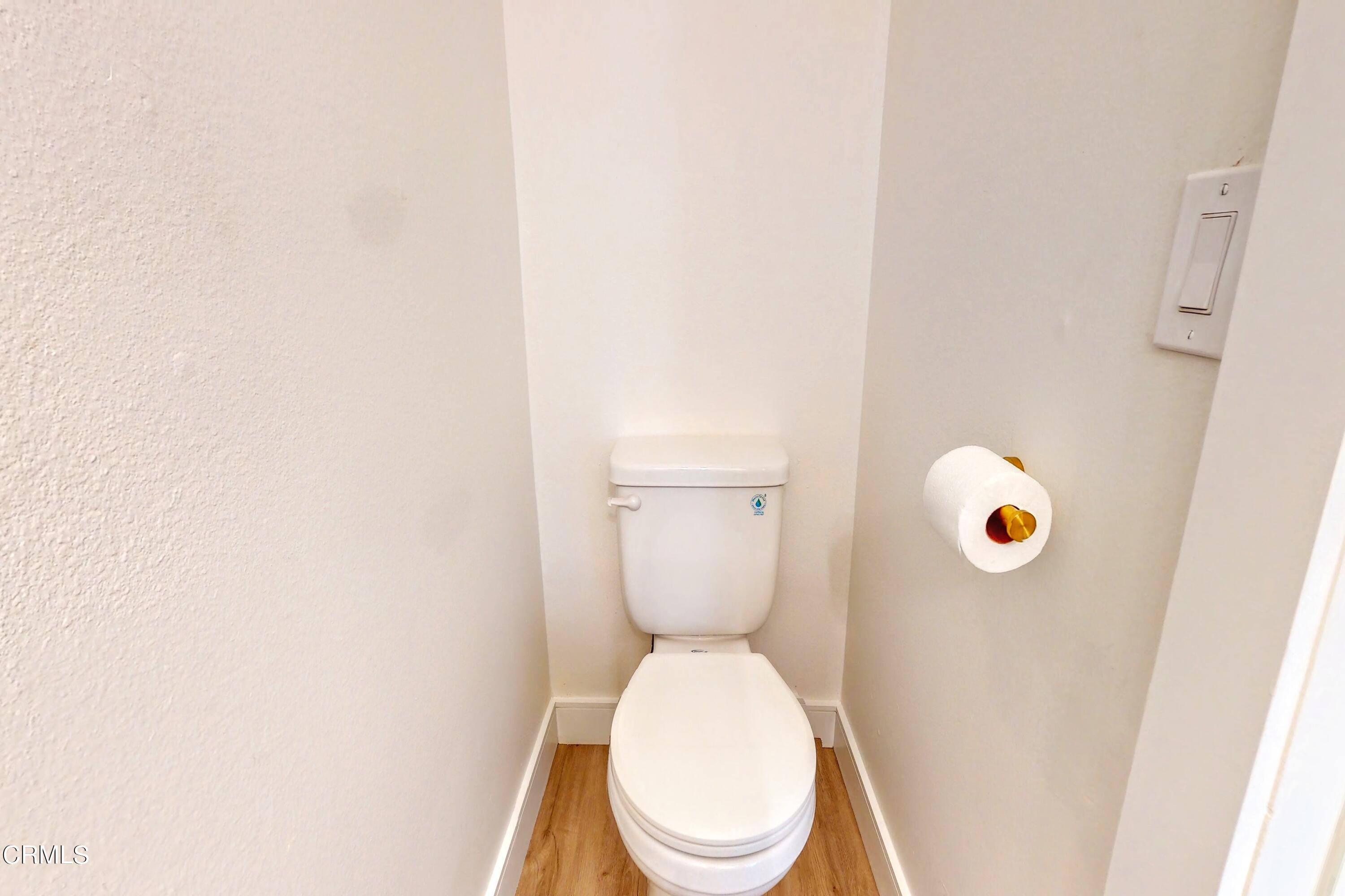 263 South Ventura Road, Unit 272 Port Hueneme, CA 93041 - Photo 19 of 40 a bathroom with a toilet and a sink