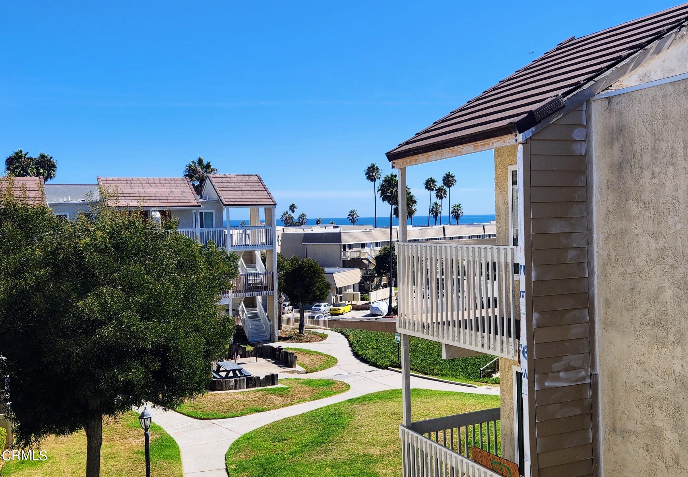 263 South Ventura Road, Unit 272 Port Hueneme, CA 93041 - Photo 2 of 40 a view of a house with backyard and porch