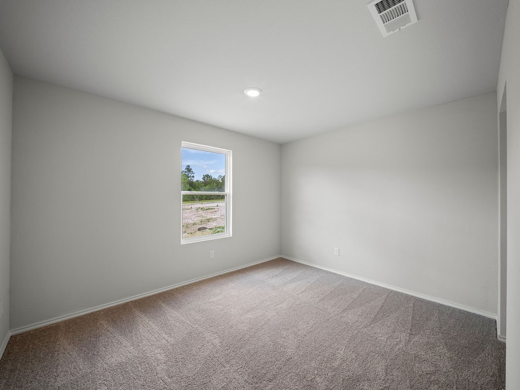 216 Stoney Ridge Lufkin, TX 75904 - Photo 17 of 21 an empty room with windows