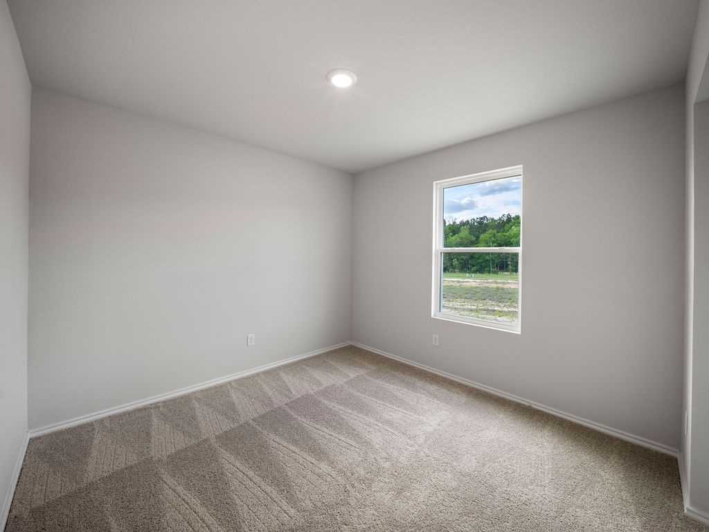 216 Stoney Ridge Lufkin, TX 75904 - Photo 19 of 21 an empty room with a window