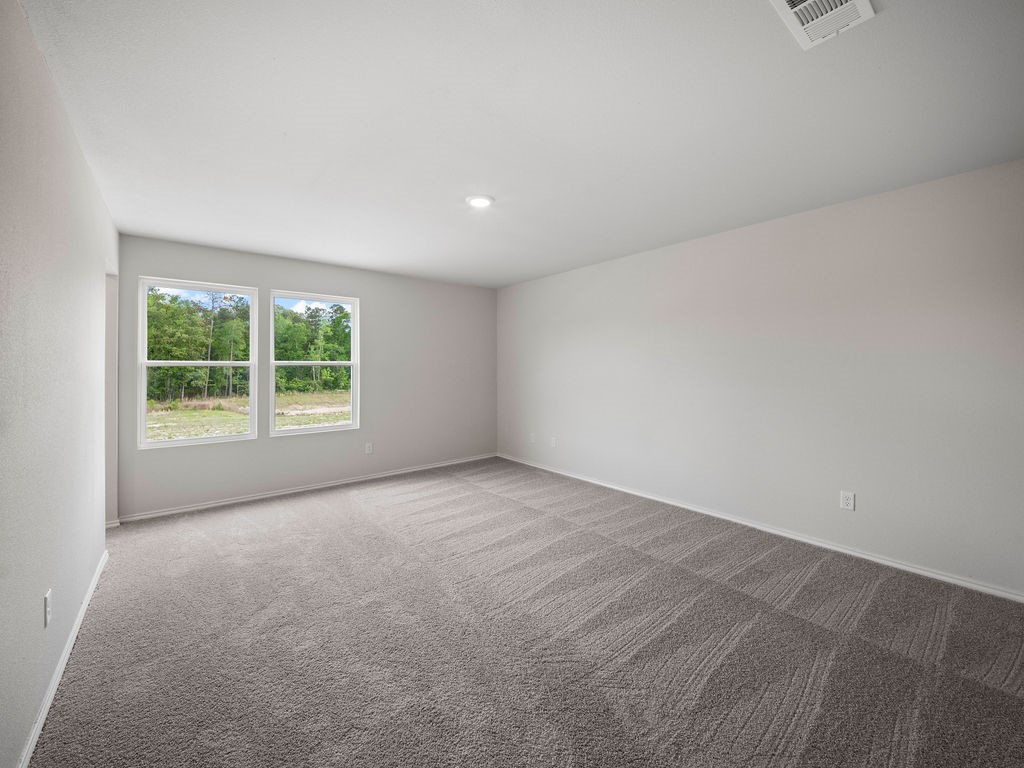 216 Stoney Ridge Lufkin, TX 75904 - Photo 10 of 21 an empty room with windows