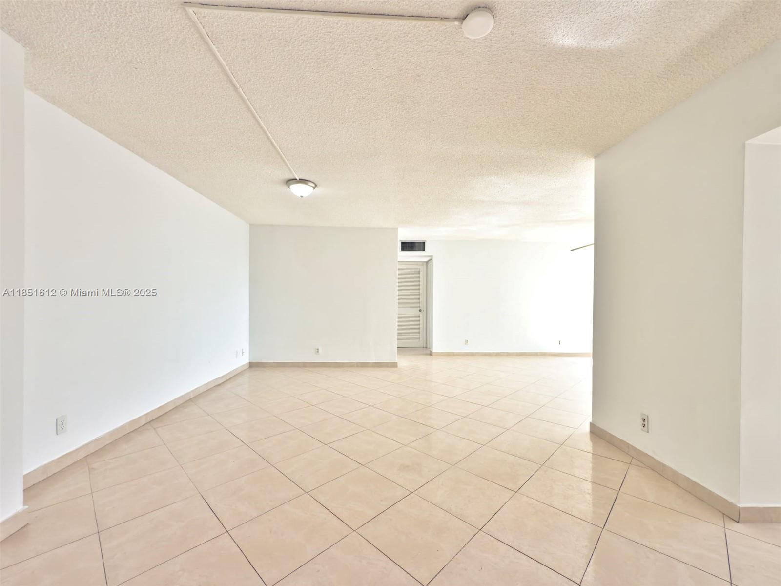 942 Northeast 199th Street, Unit 302 Miami, FL 33179 - Photo 3 of 23