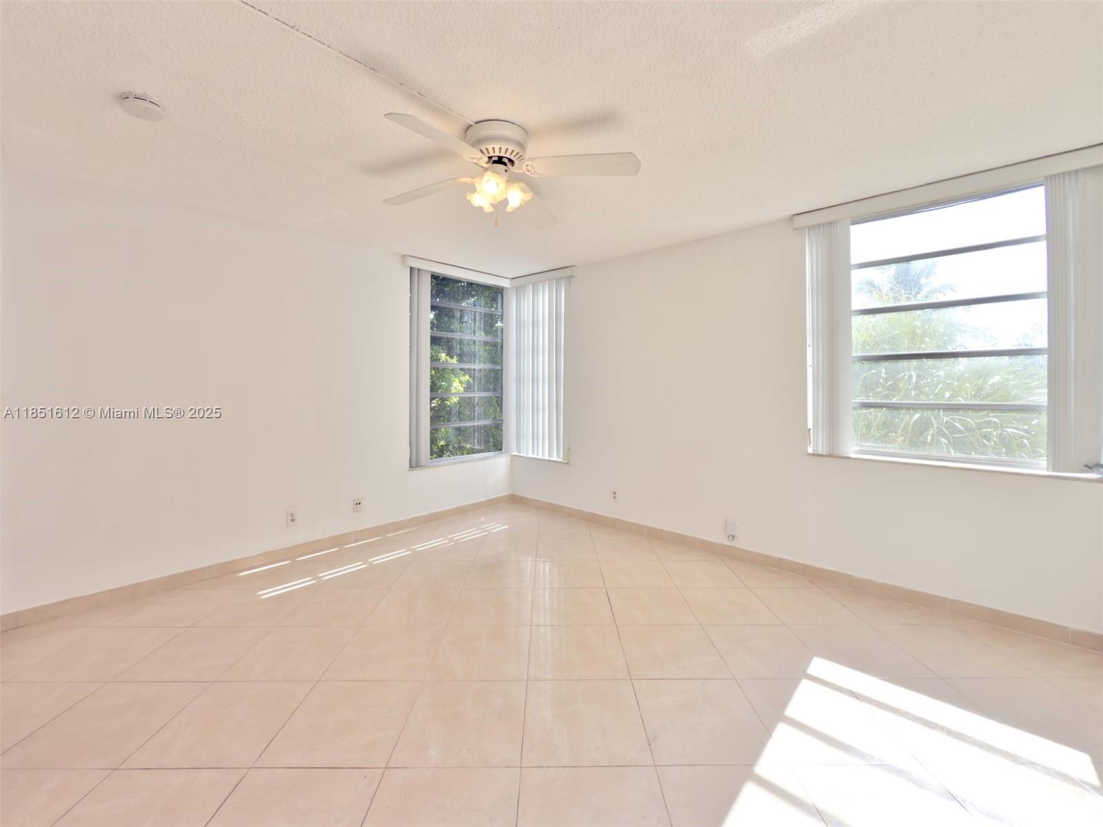 942 Northeast 199th Street, Unit 302 Miami, FL 33179 - Photo 6 of 23