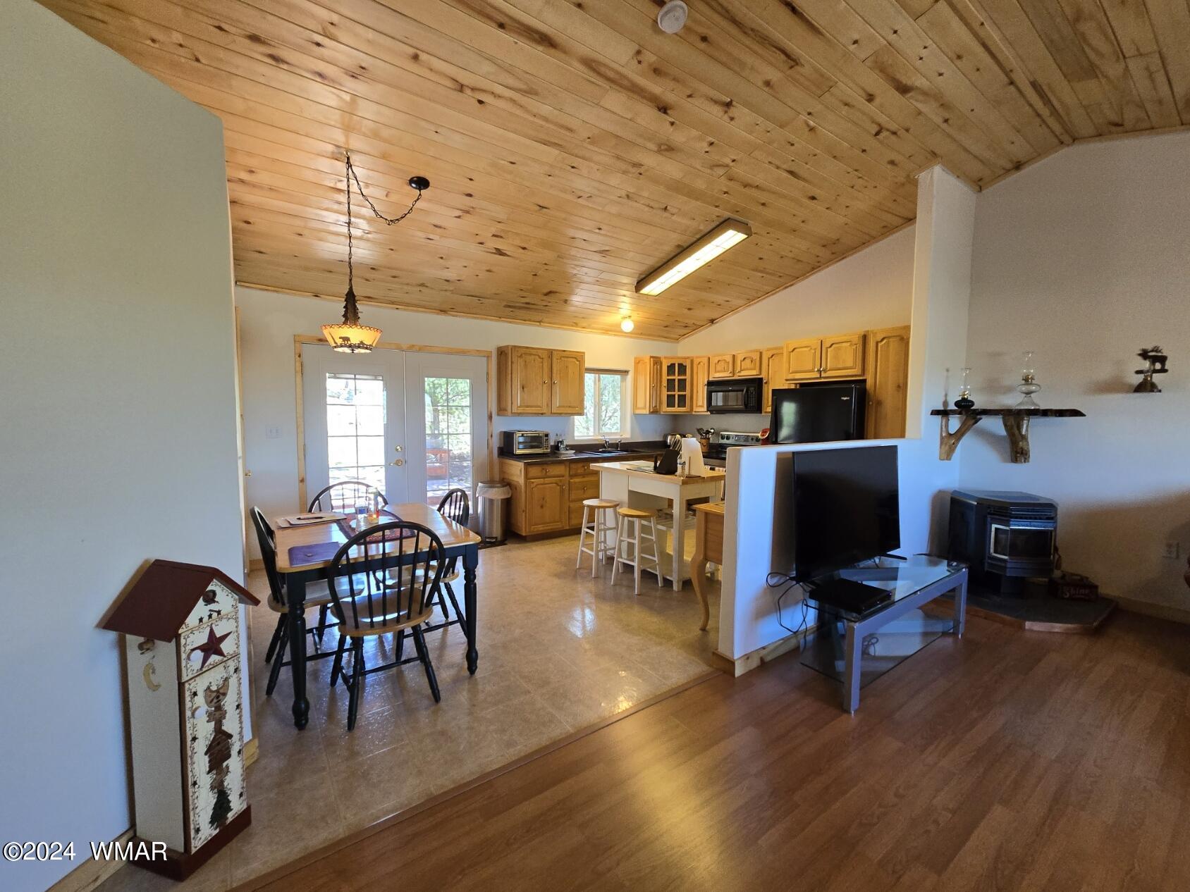 1804 Ansell Road Heber, AZ 85928 - Photo 54 of 120 a view of a dining room with furniture window and wooden floor