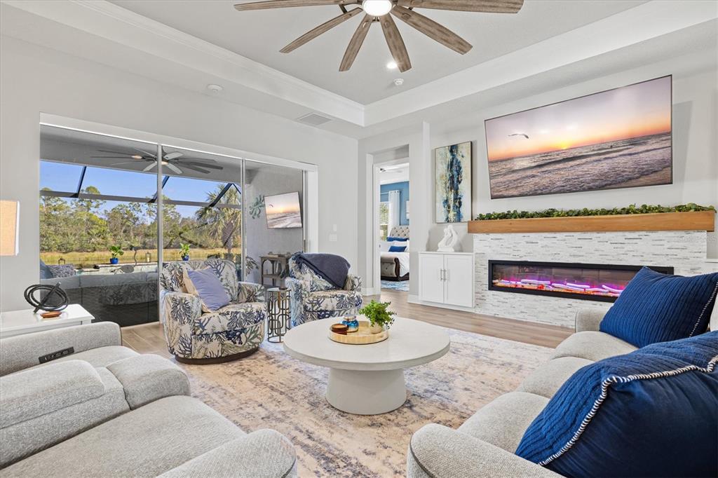 12436 Destin Loop Venice, FL 34293 - Photo 12 of 85 a living room with furniture and a large window