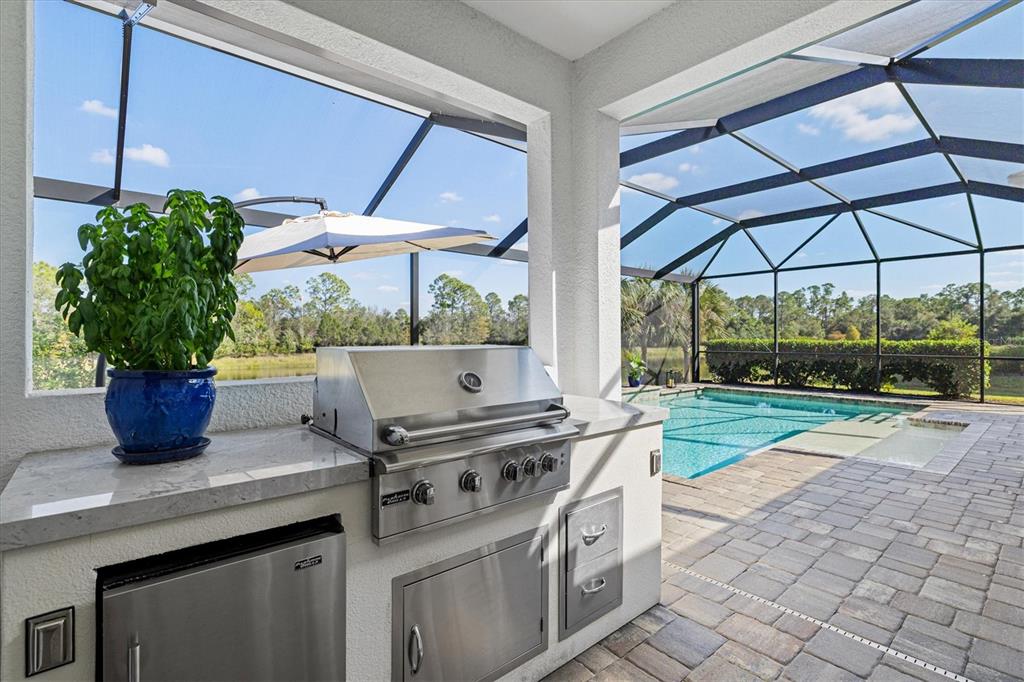 12436 Destin Loop Venice, FL 34293 - Photo 45 of 85 a view of a house with backyard and sitting area