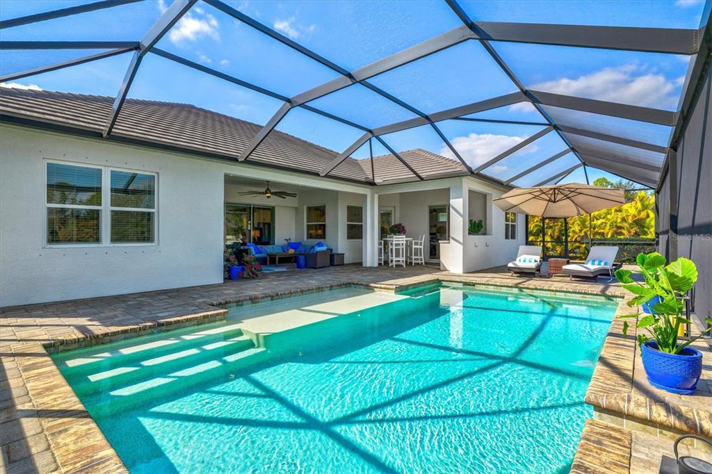 12436 Destin Loop Venice, FL 34293 - Photo 50 of 85 a view of a backyard with a patio and plants