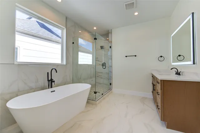 a bathroom with a sink and a bathtub