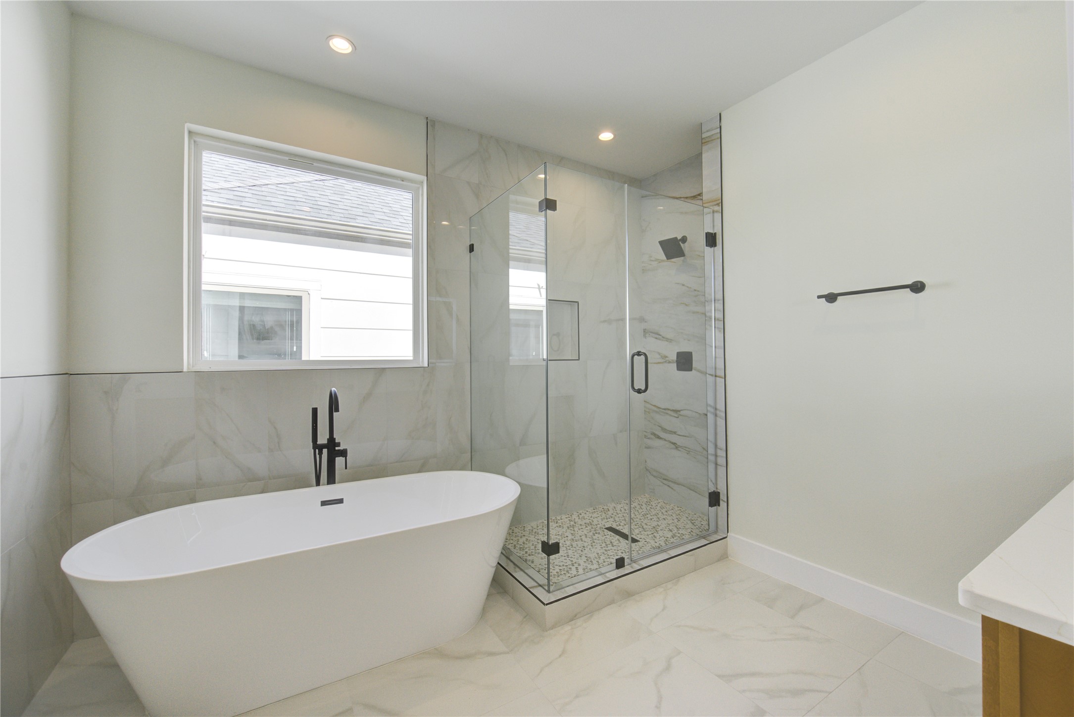 1810 Hazard Street, Unit A Houston, TX 77019 - Photo 16 of 47 a bathroom with a bathtub and shower