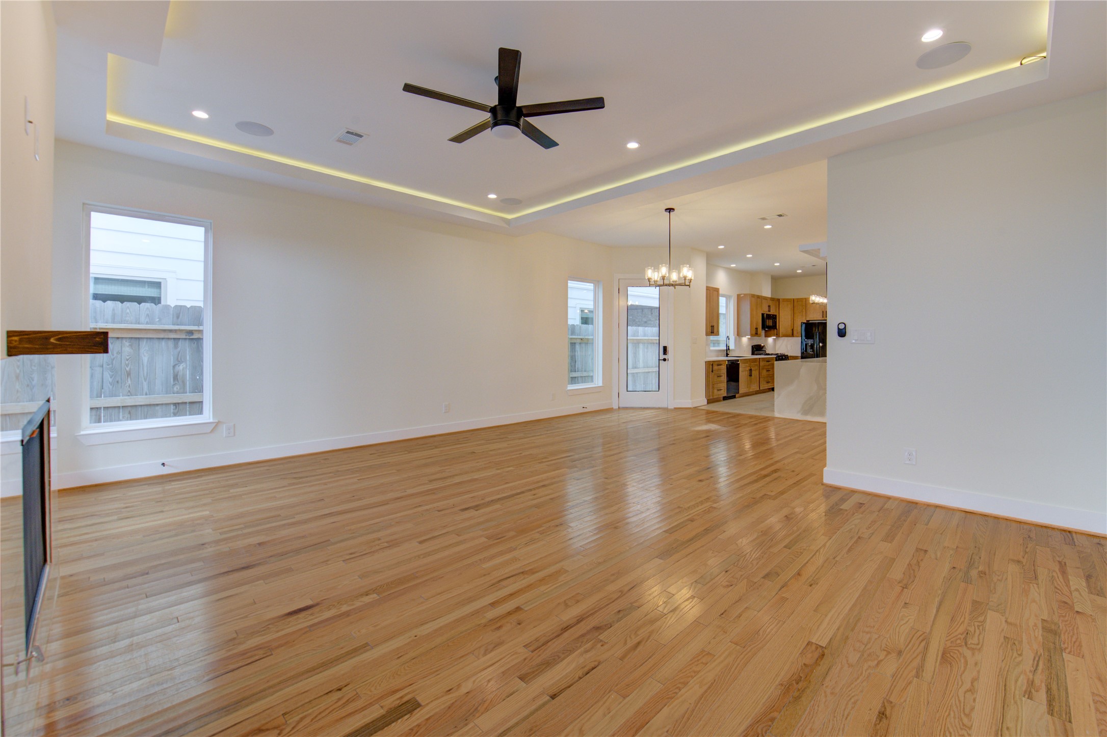 1810 Hazard Street, Unit A Houston, TX 77019 - Photo 40 of 47 a view of a livingroom with a furniture wooden floor and a ceiling fan
