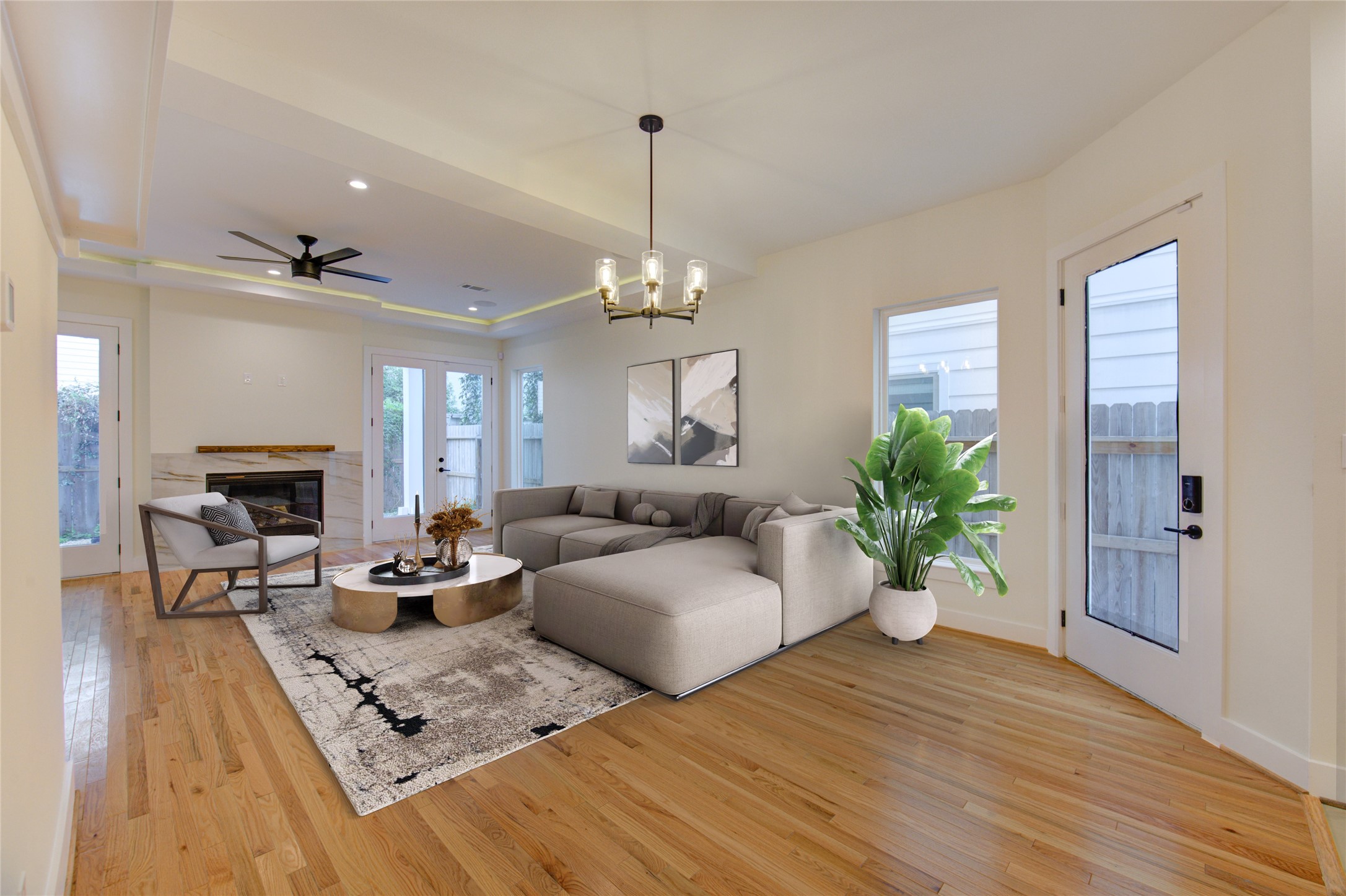 1810 Hazard Street, Unit A Houston, TX 77019 - Photo 4 of 47 a living room with furniture hard wood floor and a chandelier