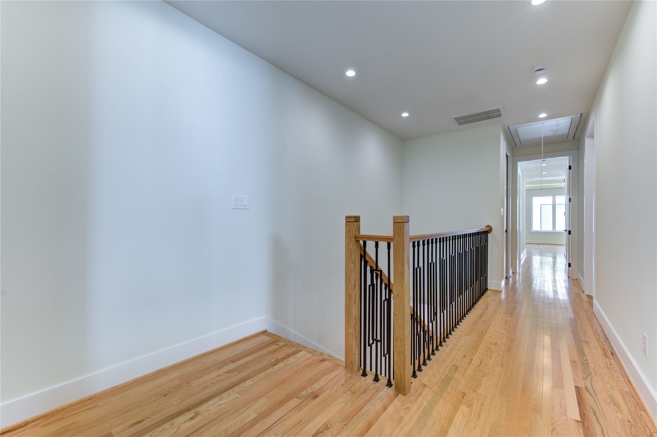 1810 Hazard Street, Unit A Houston, TX 77019 - Photo 7 of 47 a view of a hallway with wooden floor