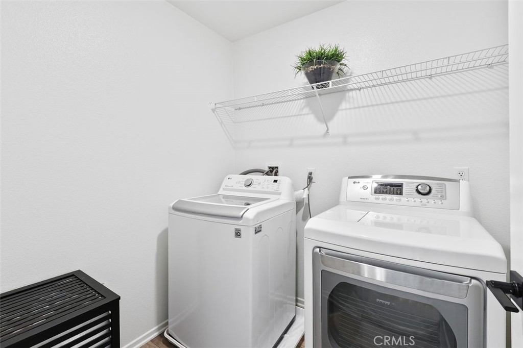 28876 Camaro Drive Winchester, CA 92596 - Photo 30 of 44 a utility room with dryer and washer