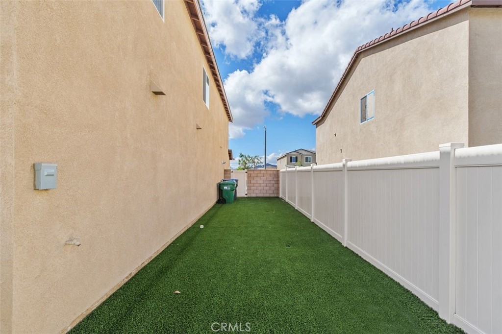 28876 Camaro Drive Winchester, CA 92596 - Photo 34 of 44 a view of a backyard with wooden fence