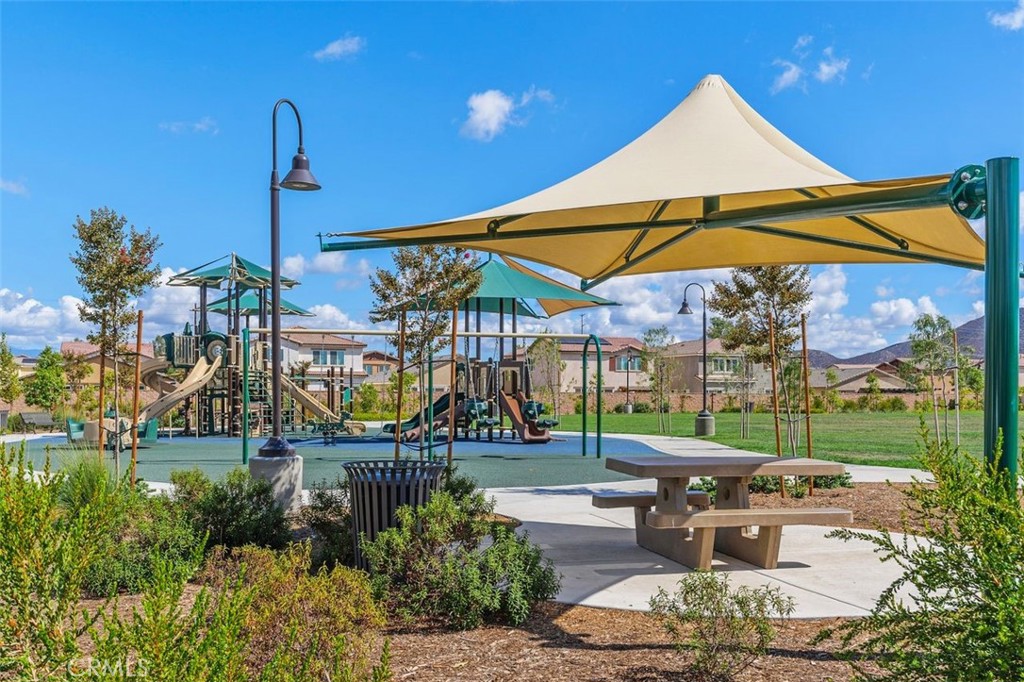 28876 Camaro Drive Winchester, CA 92596 - Photo 42 of 44 a chair and tables in the patio
