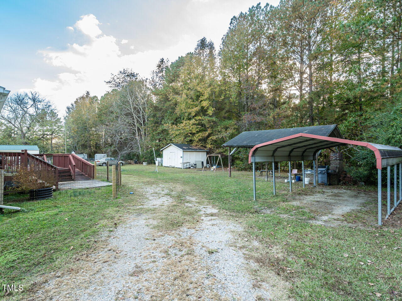 9140 Ransdell Road Raleigh, NC 27603 - Photo 22 of 26 a backyard of a house with barbeque oven