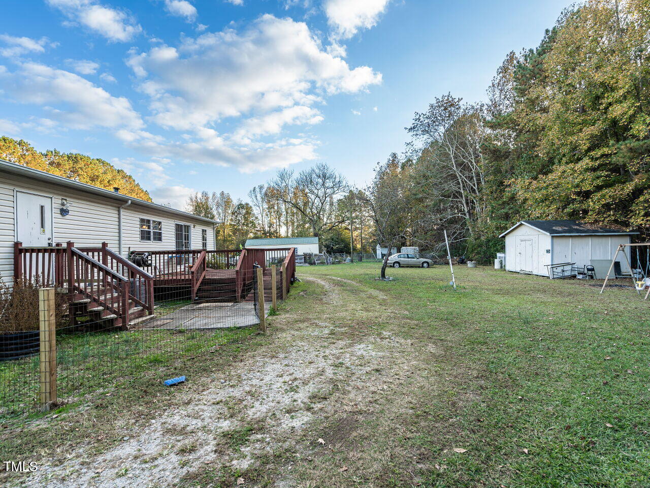 9140 Ransdell Road Raleigh, NC 27603 - Photo 23 of 26 a view of a house with backyard