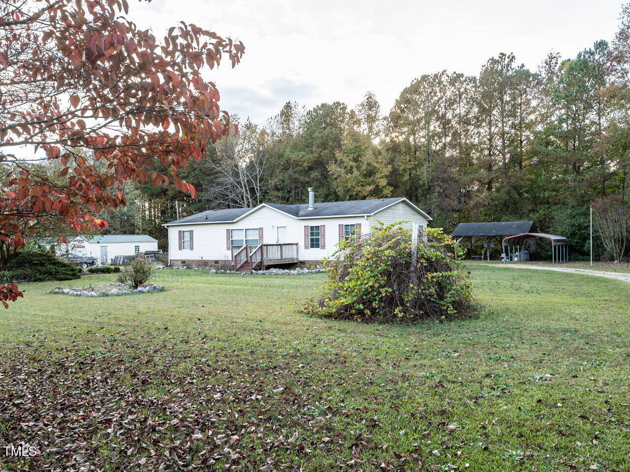 9140 Ransdell Road Raleigh, NC 27603 - Photo 3 of 26 a view of a house with a yard